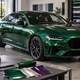 AI-generated concept of a green wrapped sedan with a digital color preview and vinyl samples